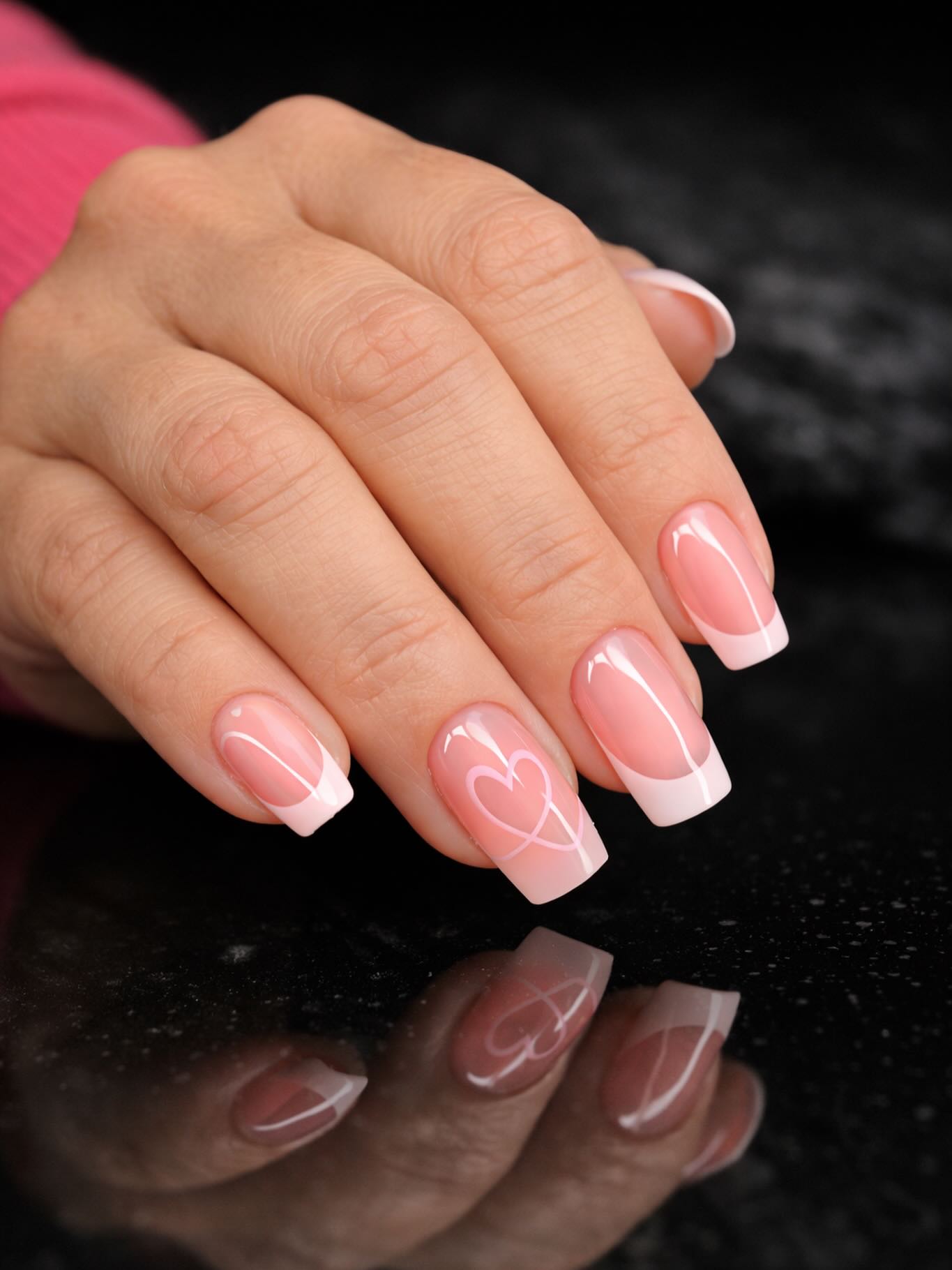 Blush pink French builder gel set with delicate heart line art by BeautifulClawz